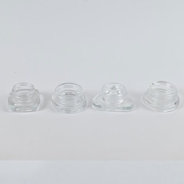 different shapes of glass cannabis jars