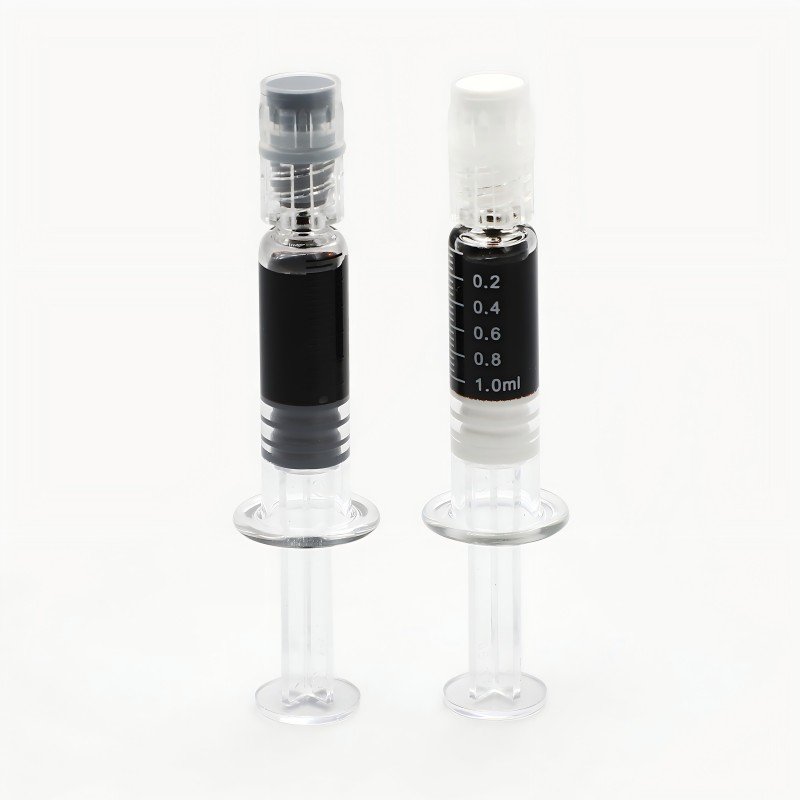 Image of RSO and FECO syringes with white markings
