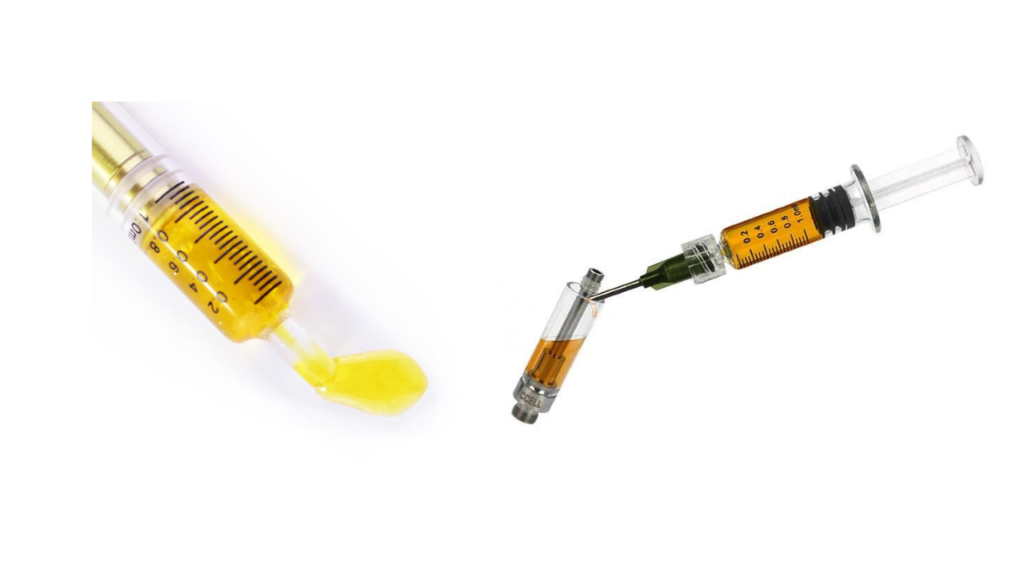Distillate syringe in use