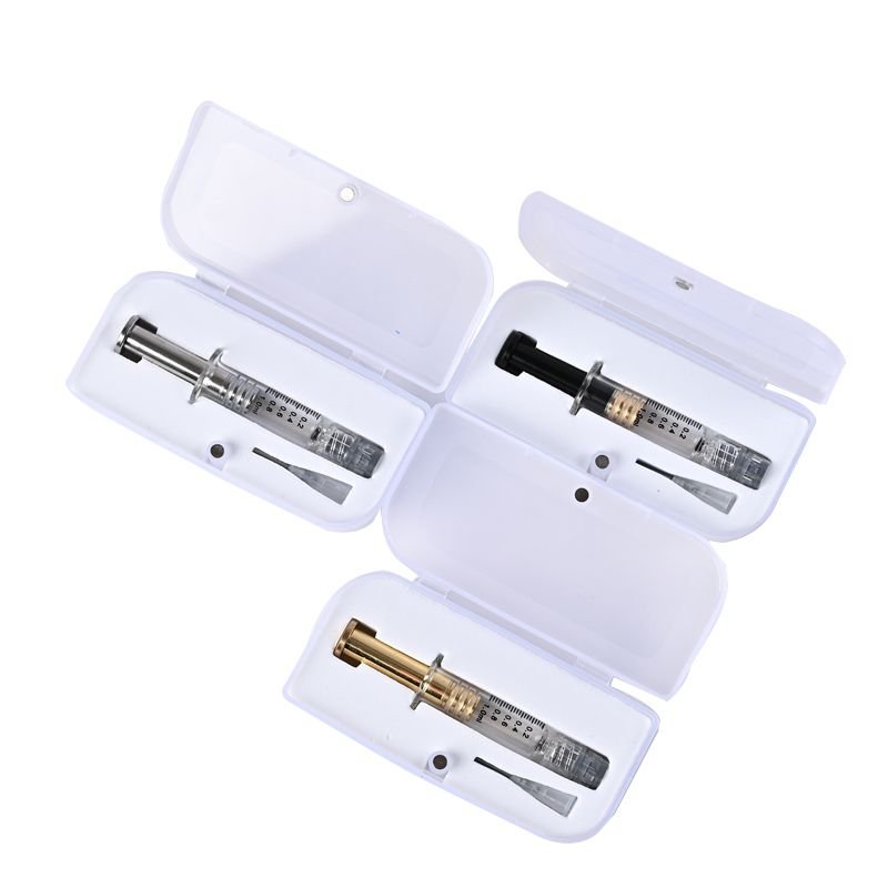 Image of cannabis oil syringes with stainless steel plungers