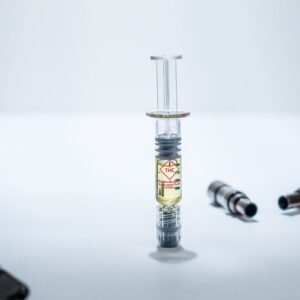 Image of cbd vaporizer and syringe