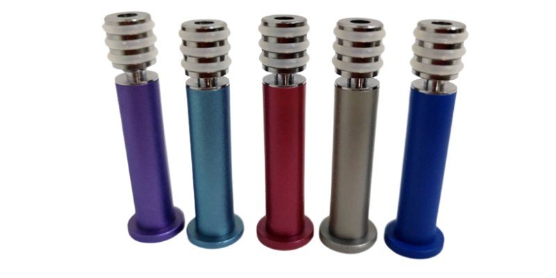 Image of colorful metal plungers