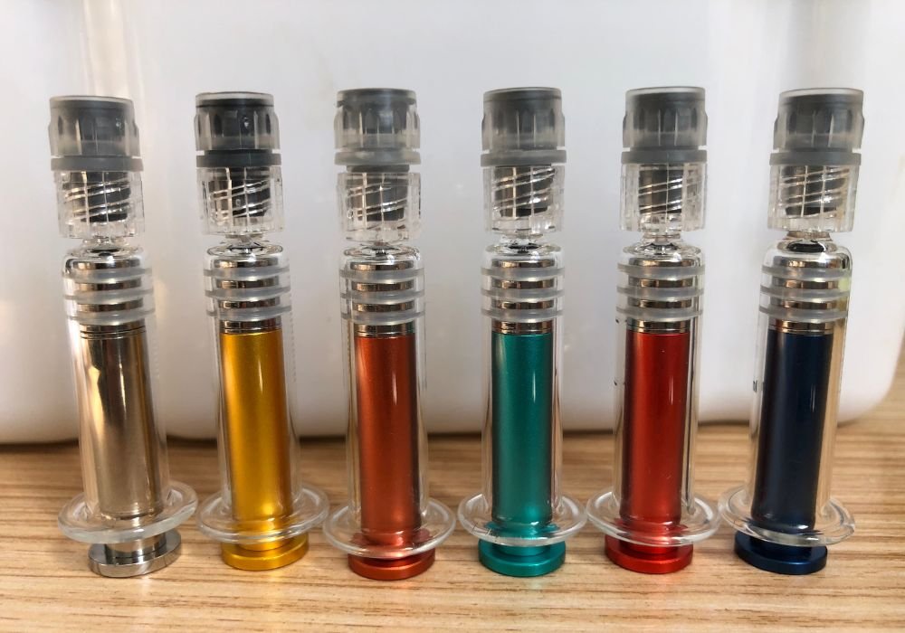 picture of oil syringes with stainless steel plungers