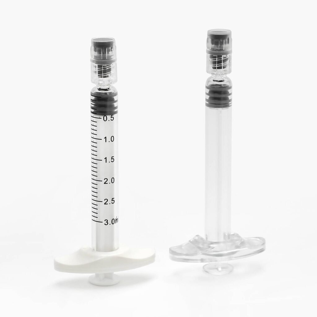 Image of glass syringes with backstops for cannabis oil